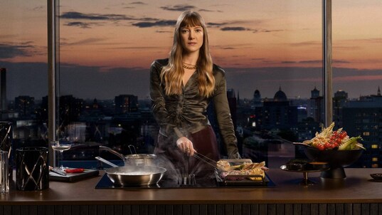 Woman in modern kitchen