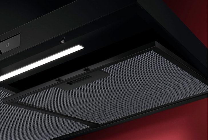Kjøkkenventilator med filter som bidrar til renere luft og lavere lydnivå.