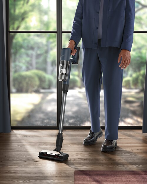 Man vacuuming floor